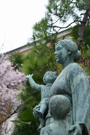 Statue of War widow with Children in Spring