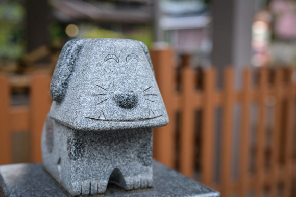 Dog statue at a cat shrine