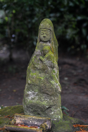Moss covered statue